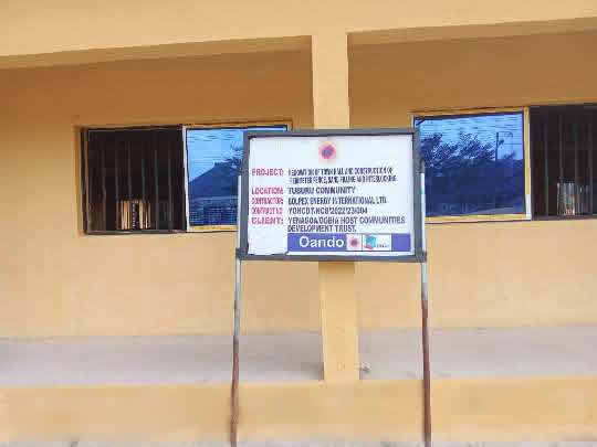 Completed building with project signboard