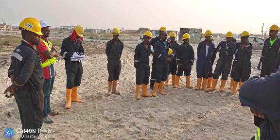 Bolpex crew in full PPE at a site toolbox talk